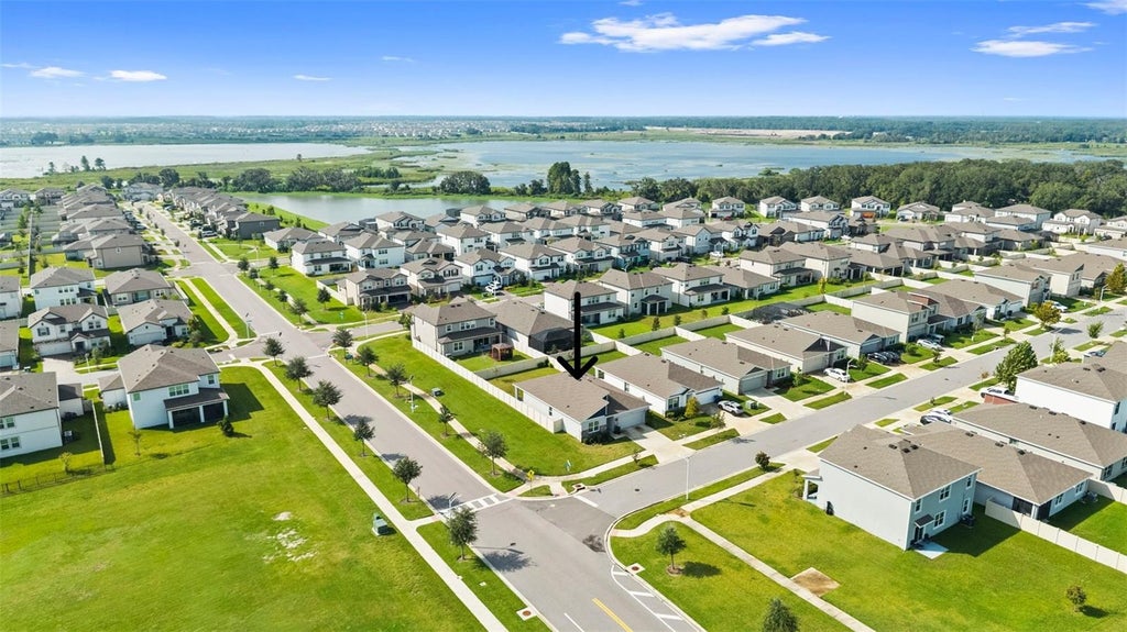 Photo of 31938 Treasure Dock Isle, Wesley Chapel, FL 33545 (MLS # TB8556974)