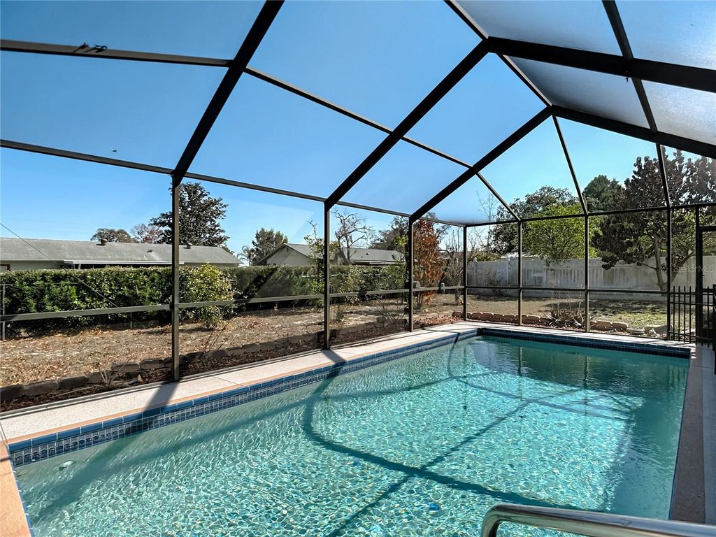 Photo of 5066 Woodbine Street, Spring Hill, FL 34608 (MLS # W7883117)