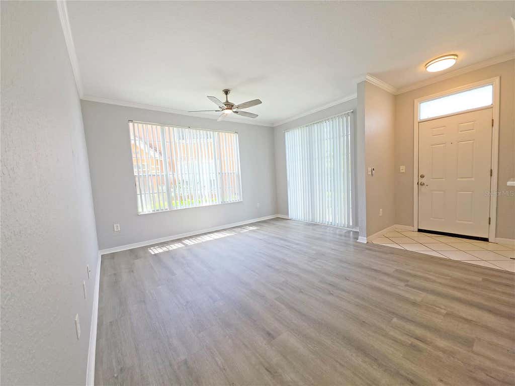 Photo of 9018 Lake Chase Island Way #9018, Tampa, FL 33626 (MLS # TB8536710)