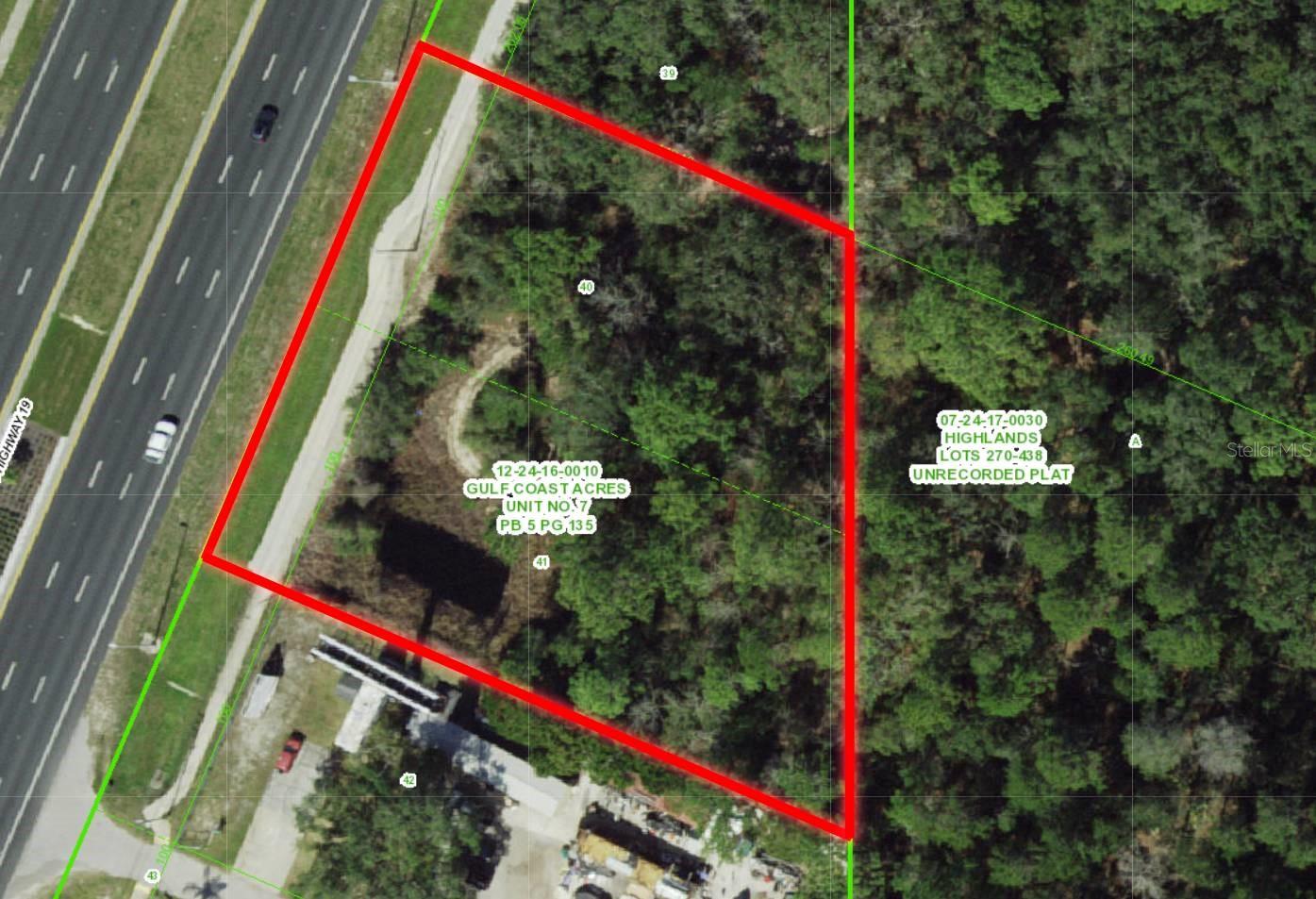 0.84 acres of unimproved, vacant land available for immediate purchase off of the busy US Highway 19 N. High and dry property located within Flood Zone X on the Eastbound side of US19. Zoned C2 with a Future Land Use of ROR-100. Owner financing is available with $100,000 down.
Vacant land rarely has an address or lot number posted. There have been occasions when a buyer has closed on a property and determined, after the closing, that the property conveyed to the buyer was not the property the buyer had visually identified prior to signing the contract. It is the buyer’s responsibility to confirm the legal description of the property the buyer wants to purchase prior to the end of the contract Property Inspection Period. The best way to accomplish this is for the buyer to obtain a survey that depicts a physical immovable object on the property or adjacent to the property that irrefutably confirms the property identified in the survey is the property the buyer wants to purchase.
