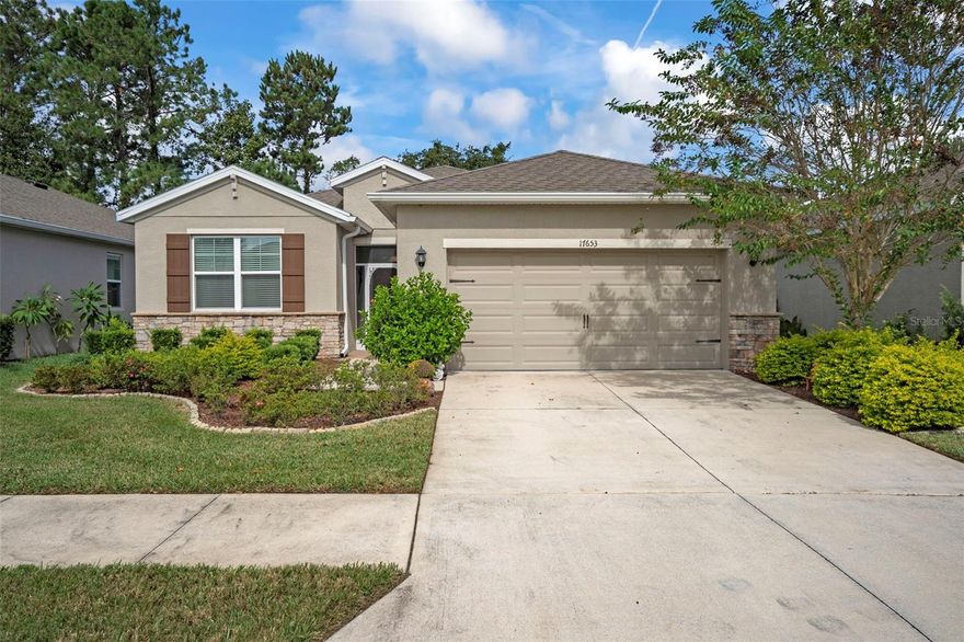 Welcome to this lovely, move-in ready 3-bedroom, 2-bath single-family home nestled in the sought-after-gated golf course community of Hernando Oaks. With no rear neighbors and tucked away on a quiet circle with just 45 homes, this property offers exceptional privacy with unmatched convenience.  Built in 2019 and offering over 1600 square feet of heated living space, this home features a thoughtfully designed open floor plan with loads of closet space and a gorgeous view of the golf course. Step into the heart of the home—an upgraded kitchen boasting granite countertops, stainless steel appliances, an abundance of cabinetry, and a spacious walk-in pantry. Enjoy the outdoors year-round from your glass and screen enclosed sunroom which leads to a large 11’ x 16’ wooden deck perfect for outdoor entertainment and/or relaxation.  Inside, your primary bedroom features an en-suite bathroom with granite counters and dual vanities as well as a large walk-in closet.  A 3-way split floor plan ensures privacy from each bedroom. Laundry is a breeze with your sizable laundry room boasting added cabinets as well as an additional standing freezer.  Your lawn is maintained by the HOA and included in your low HOA fee.  Community features include a golf course, driving range, pro shop, on-site restaurant as well as pickleball courts. With no CDD’s and no flood insurance required, this home will not last.  Don’t miss your chance to own this move-in ready gem in one of Hernando County’s most desirable communities with quick access to US-41 and the Suncoast Parkway for an easy commute to Tampa, airports, and the Gulf beaches. Schedule your private showing today!