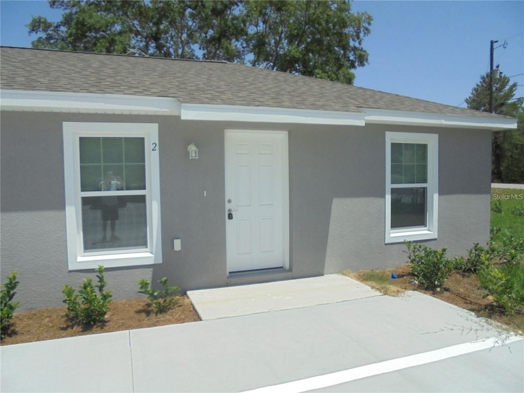 Photo of 1 Fisher Terrace Trace #202, Ocklawaha, FL 32179 (MLS # OM713101)
