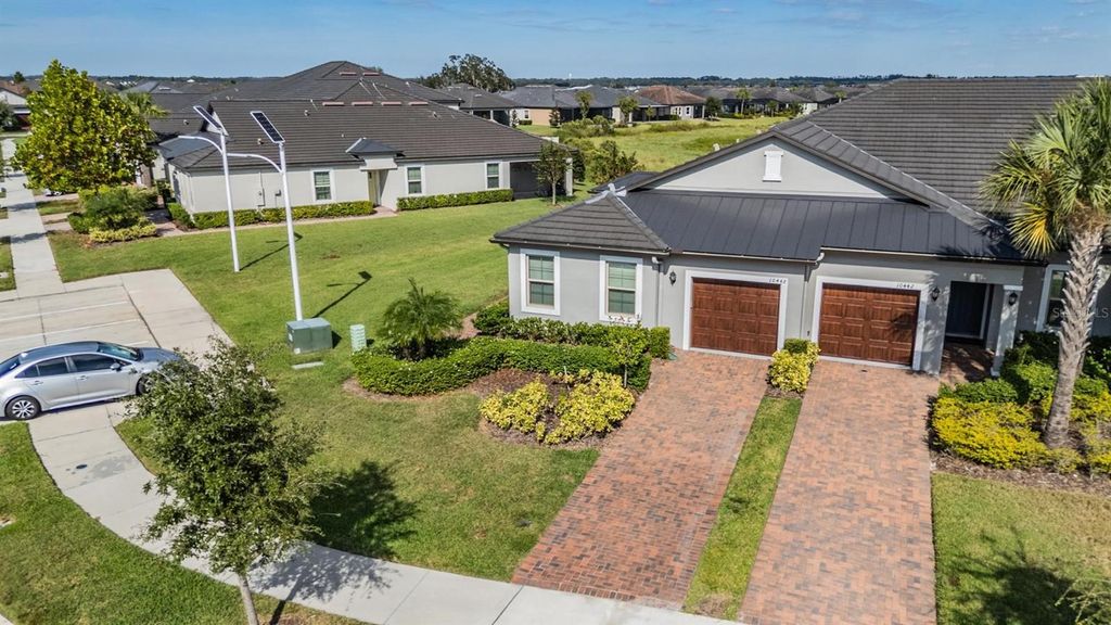 Photo of 10448 Echo Dock Loop, San Antonio, FL 33576 (MLS # TB8440889)