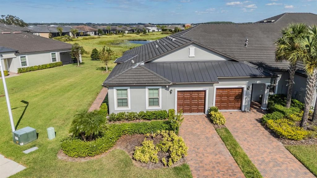 Photo of 10448 Echo Dock Loop, San Antonio, FL 33576 (MLS # TB8440889)