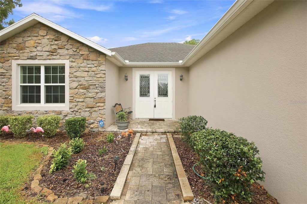 Photo of 555 Dowling Circle, Lady Lake, FL 32159 (MLS # OM730516)