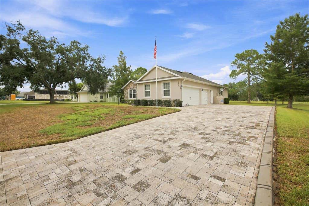 Photo of 555 Dowling Circle, Lady Lake, FL 32159 (MLS # OM730516)