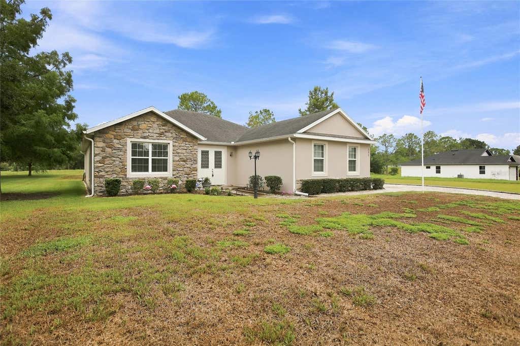 Photo of 555 Dowling Circle, Lady Lake, FL 32159 (MLS # OM730516)
