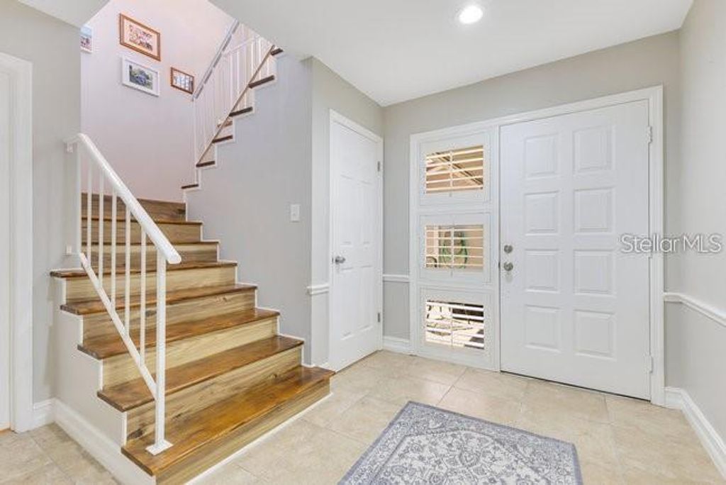 Photo of 8035 Bayside View Drive, Orlando, FL 32819 (MLS # O6400444)