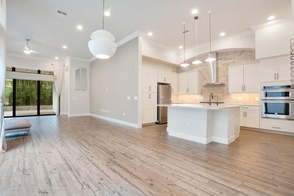 Photo of 8394 Via Vittoria Way, Orlando, FL 32819 (MLS # O6398544)