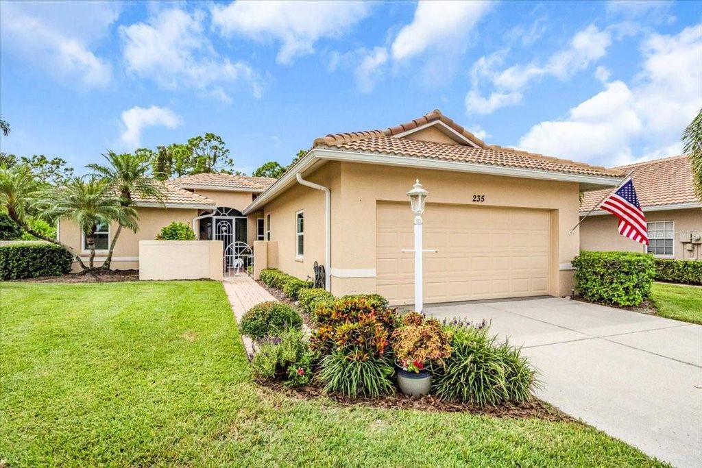 Photo of 235 Auburn Woods Circle, Venice, FL 34292 (MLS # A4665479)