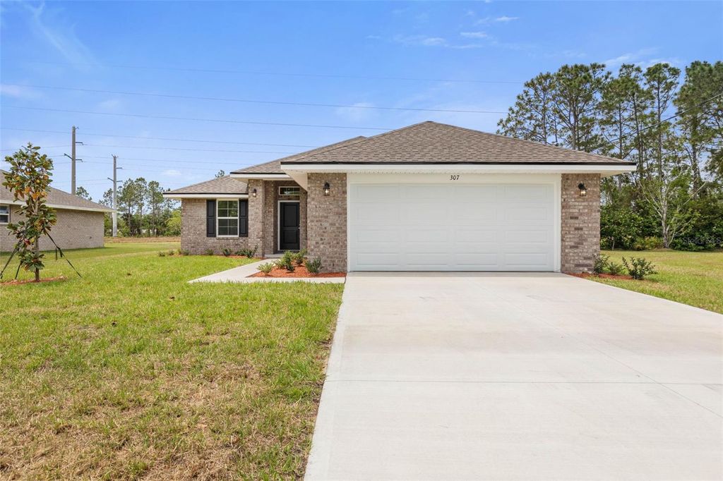 Photo of 47 Brunswick Ln, Palm Coast, FL 32164 (MLS # FC315830)