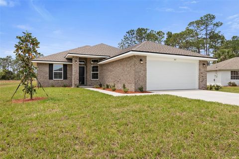 Photo of 47 Brunswick Ln, Palm Coast, FL 32164 (MLS # FC315830)