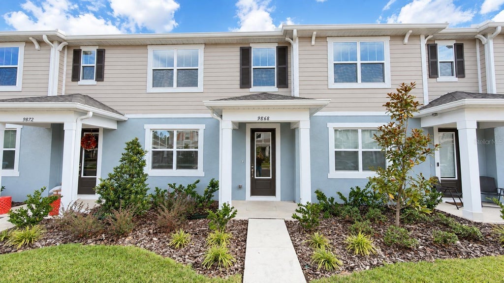 Photo of 9868 Walkway Drive, Orlando, FL 32832 (MLS # O6450561)