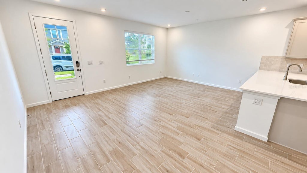 Photo of 9868 Walkway Drive, Orlando, FL 32832 (MLS # O6450561)
