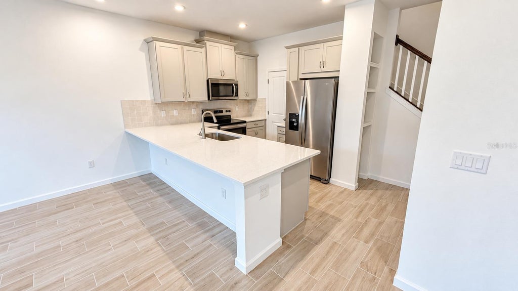Photo of 9868 Walkway Drive, Orlando, FL 32832 (MLS # O6450561)