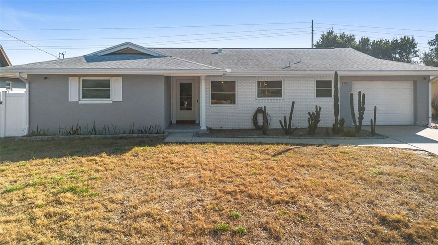 Updated and move-in ready, this 2-bedroom + flex room, 2-bath home is perfectly located in the heart of Orange City, close to all the shopping and conveniences you could need. Recent upgrades include new windows, beautifully remodeled bathrooms, and updated flooring throughout—wood-look tile flows through the main living areas, while new vinyl flooring has been added to a bedroom, bathrooms, and flex room. Both the garage and patios feature high-end Shark flooring, adding durability and a clean, finished look. Inside, the layout is open and functional, with the kitchen to the right upon entry and a spacious living and dining area straight ahead. Just off the dining room is a versatile flex space currently used as a home office, but easily adaptable as a playroom, hobby space, or additional living area. Both bedrooms are tucked down the hallway off the living room and share a fully remodeled bathroom, while the second remodeled bathroom is located on the opposite side of the home—ideal for guests or added privacy. The laundry room is generously sized, and the oversized one-car garage offers exceptional depth, currently set up for storage and a home gym but easily accommodating a vehicle with room to spare. Located in the NO-HOA Breezewood community, this home offers an incredibly convenient lifestyle just minutes from shopping, Blue Springs State Park, sports complexes, medical offices, and quick access to I-4.