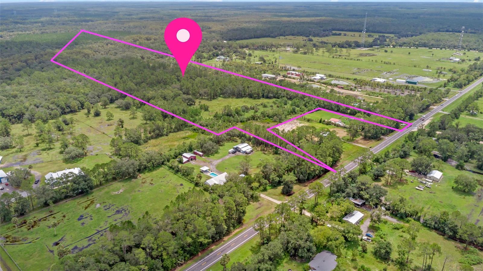 The owner was planning to build their estate on the property, but their plans have since changed! 30 acres of lush Florida land being offered for sale! This property is partially cleared and was intending to be a home site, but the seller's plans have since changed. Direct driveway access onto SR 11 between Bunnell and Deland with surrounding homes, farmland, and quiet country acres. This is a beautiful property with so much potential for privacy and quiet, Florida living. All information taken from the tax record, and while deemed reliable, cannot be guaranteed.