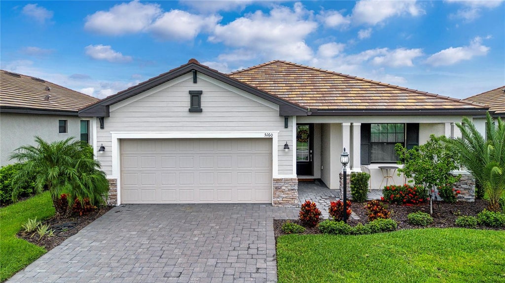 Photo of 5160 Coral Reef Way, Bradenton, FL 34211 (MLS # A4702149)