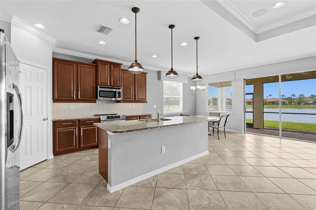 Photo of 7360 Talon Bay Drive, North Port, FL 34287 (MLS # A4688787)