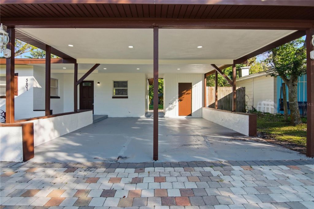 Photo of 5601 Meridian Way, Orlando, FL 32808 (MLS # O6356948)