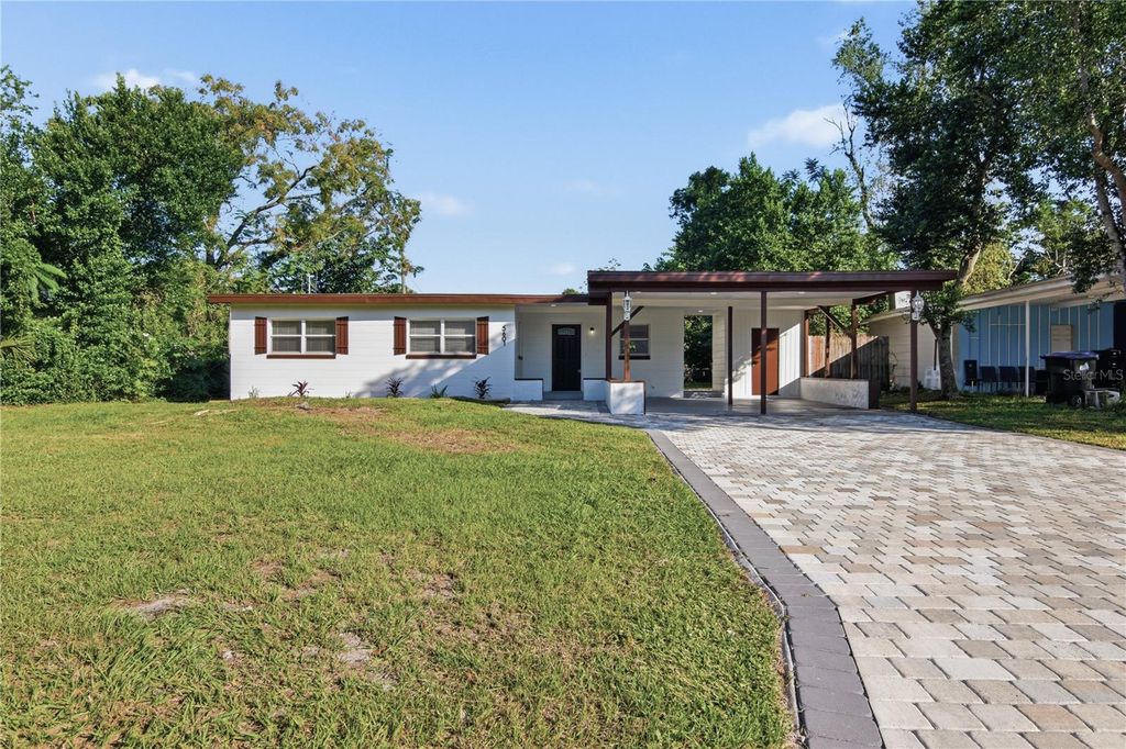 Photo of 5601 Meridian Way, Orlando, FL 32808 (MLS # O6356948)