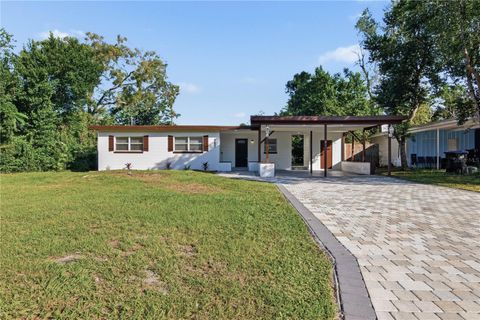 Photo of 5601 Meridian Way, Orlando, FL 32808 (MLS # O6356948)