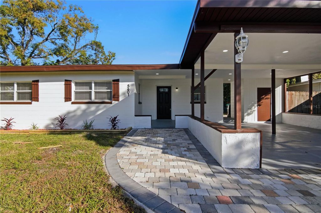 Photo of 5601 Meridian Way, Orlando, FL 32808 (MLS # O6356948)