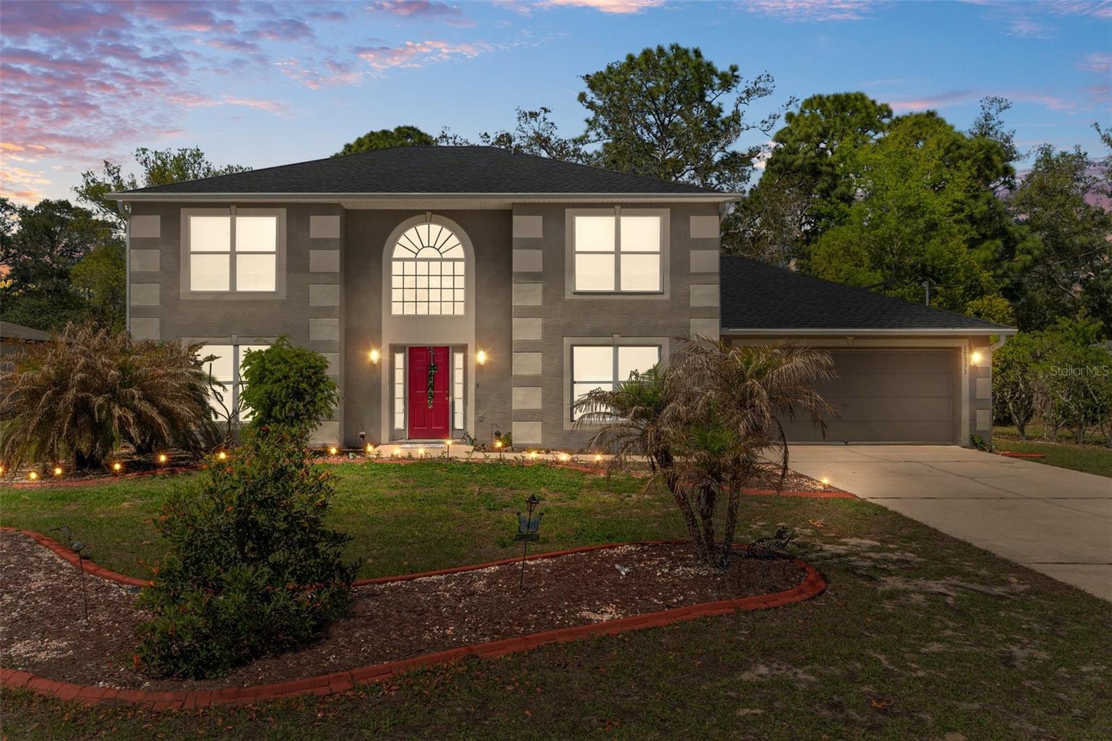 Proud to Present this 3 bedroom, 3 (2/1) bath two story POOl home settled nicely on a half acre lot! This home has 2,356 Sq Ft of living space which includes a large flex room that can be used as an office, den, or additional bedroom. No HOA or CDD! As you pull up to the home you'll see the nice curb appeal and front yard along with the decently sized and level drive way that leads to the 2 car garage. The interior of the Home has plenty of extras as well! The kitchen has updates that include marble counters, and a wood block island. There is a large electric fire place in the family room as well. The back yard is amazing with generous views from the screened in lanai and in-ground POOL, also with a JACUZZI that both look over the beautiful and spacious fenced in back yard. This home also includes a newer and clean SHED in the back yard with electric already set up. The major updates have been taken care of as well with a newer HVAC unit, roof, and SOLAR HOT WATER HEATER This Home has a lot to provide to its new owner so check out the video link and schedule a showing today !