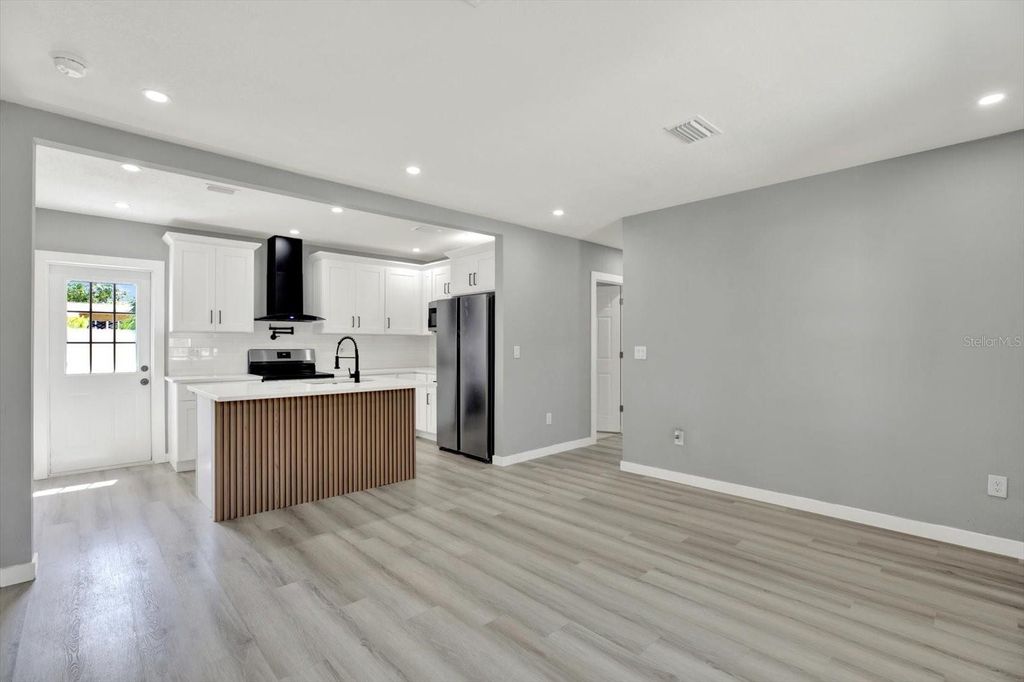 Photo of 1235 Stockton Drive, Clearwater, FL 33755 (MLS # TB8423059)