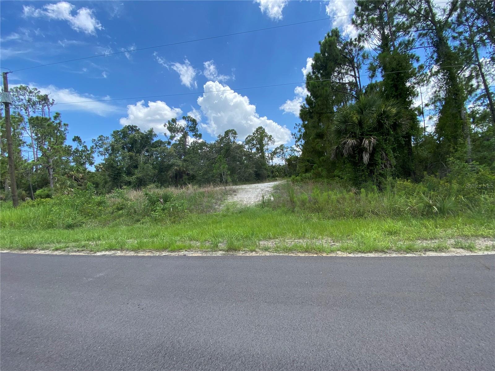 Reduced Price!!Oversized lot located in a quiet area of North Port, this lot has a new house built right across from it.Come and build your dream home on this beautiful vacant lot, close to I-75! It's not in a flood zone,not too far from shopping centers, entertainment, restaurants, and much more! Claim this lot and call today!