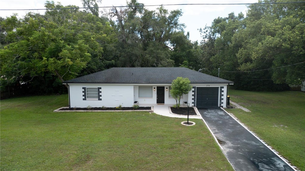 Photo of 374 W Graves Avenue, Orange City, FL 32763 (MLS # V4951044)