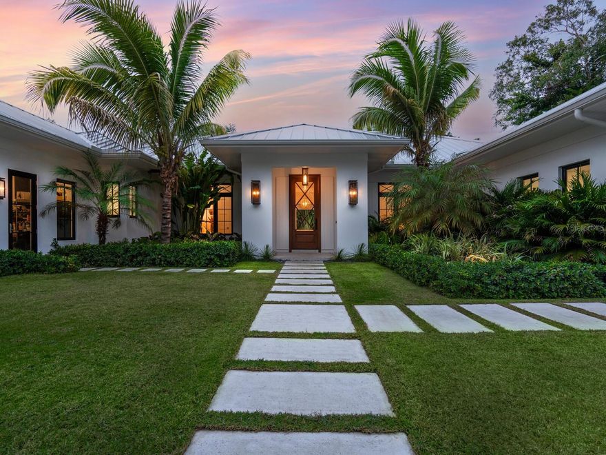 Inspired by the colors, sights, and spirit of the beach, this Oyster Bay residence is a stunning reflection of coastal glamour. Nestled on a quiet street, and walking distance to the historic, members only Field Club, explore the natural beauty and cultural treasures of Sarasota. Built in 2020 by a premiere local builder, every detail expresses a sense of pure style and status. Designed with the entertainer in mind, this home offers plenty of entertaining space, wet bar, and large hidden pantry. Splashes of pattern, natural textures, beams, crown molding, and detailed trim paint a picture of laid back elegance in the tradition of grand seaside resorts. The main living area with fireplace opens to the well-appointed kitchen, dining room, and expansive porch. The master suite boasts a vaulted wood-beamed ceiling, dual closets, and magazine-worthy bath. There are two additional bedrooms – all of which offer en-suite baths. Providing room to relax, retreat, or sprawl, the home also includes a private office. Outdoors, sophisticated architecture and landscape design perfectly complement the pedigreed location. Large sliding glass doors transition from inside to out while a summer kitchen welcomes alfresco dining. Take a dip in the sparkling pool and spa, enjoy the epitome of Sarasota coastal living.