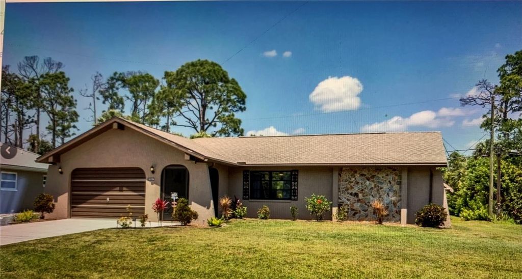 Photo of 18094 Ackerman Avenue, Port Charlotte, FL 33948 (MLS # C7503850)