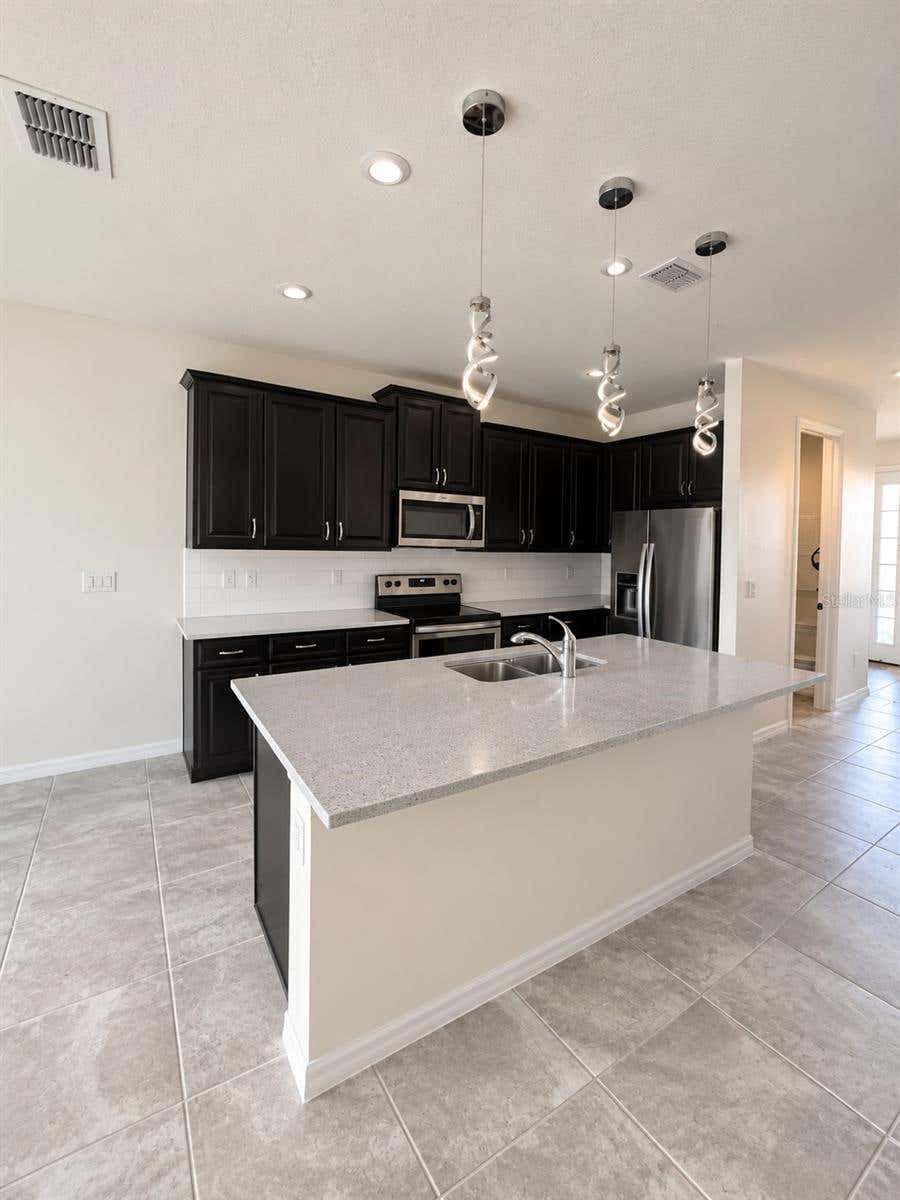 Photo of 2440 Varenna Loop, Kissimmee, FL 34741 (MLS # S5156241)