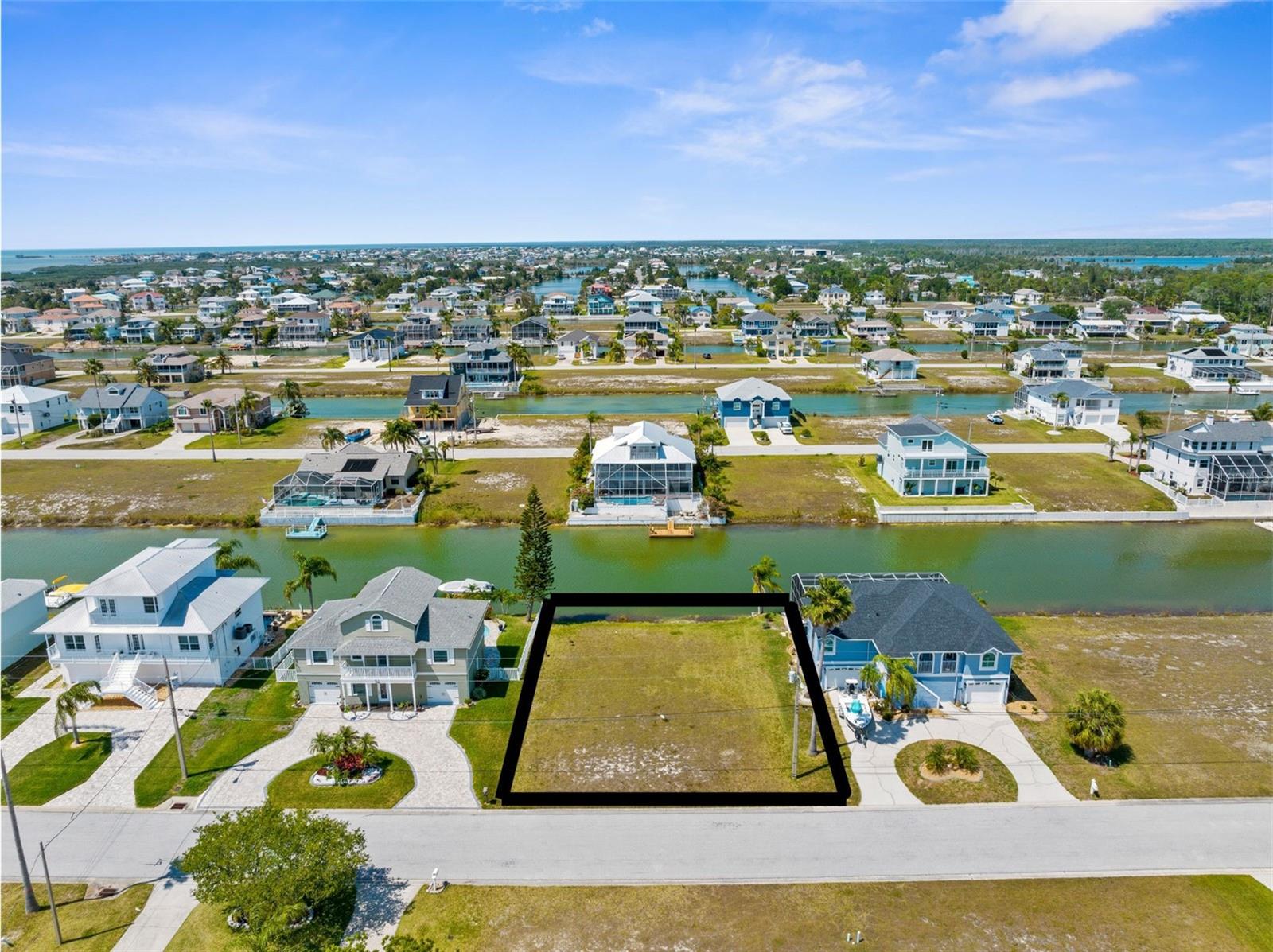 Imagine starting your day with a paddle through quiet canals or heading out for an afternoon boat ride to the Gulf. This 7,500 sq. ft. waterfront lot in Hernando Beach South is the perfect spot to build a home that fits your love for the water and the Florida lifestyle.
Tucked into a friendly, golf cart community, this lot offers more than just a place to build—it offers a lifestyle. With water access, you’ll be able to launch your kayak, paddleboard, or boat right from the nearby community ramp. Spend your days exploring the coastal waters and your evenings unwinding on your back porch with a view. Room to design a custom single-family home, thanks to R1C zoning, Peace of mind in a well-maintained area with an Annual HOA, A chance to build smart in a flood zone neighborhood made for elevated, coastal-style homes, Easy access to the Gulf of America—perfect for weekend boating, fishing trips, or sunset cruises , A relaxed, fun-loving golf cart community where neighbors wave and the pace are slower , Just minutes from great local restaurants, and outdoor fun at Weeki Wachee Springs State Park. Whether you're dreaming of peaceful mornings on the water or spontaneous afternoon adventures, this lot gives you the freedom to live how you want—by the water, in the sun, and close to everything that makes coastal Florida so special.