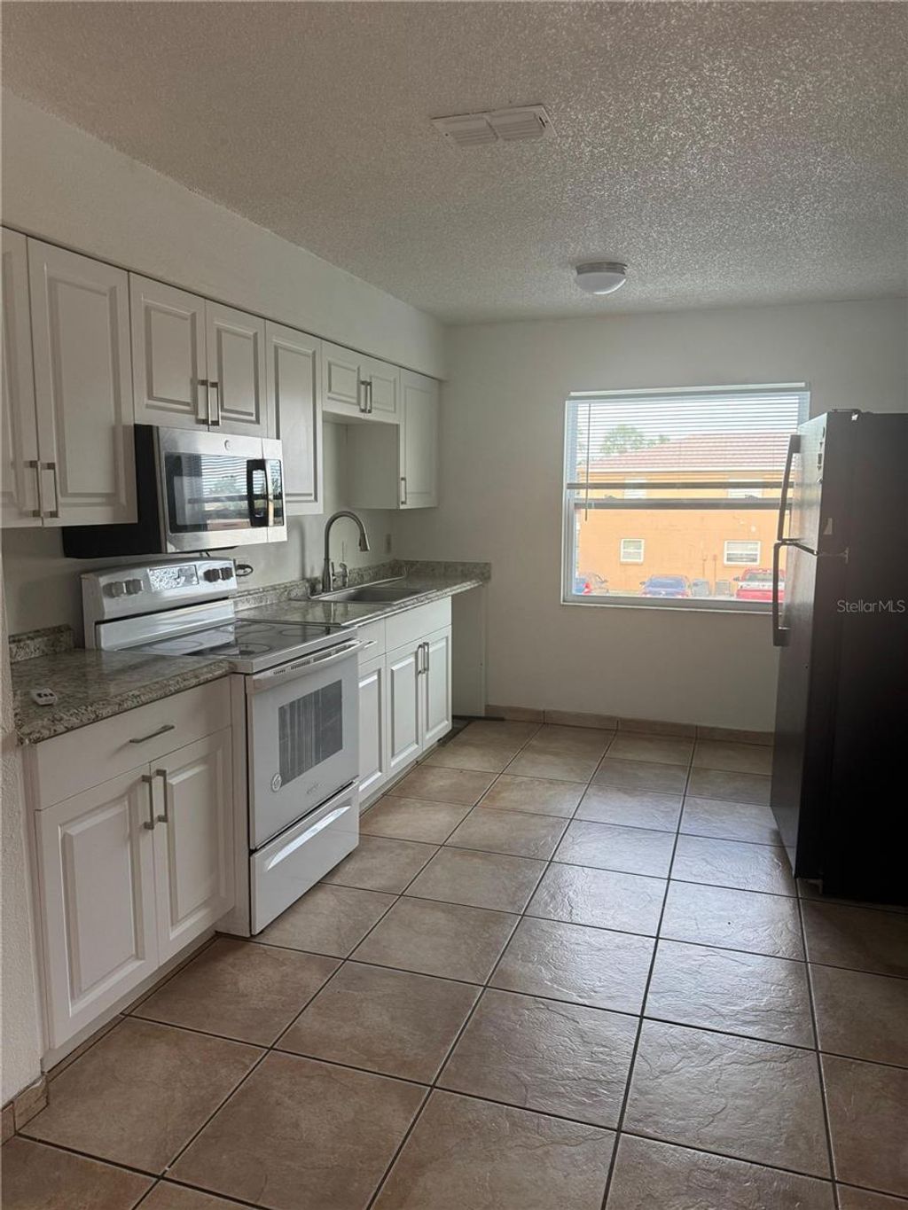 Photo of 712 Michigan Ct #3, Saint Cloud, FL 34769 (MLS # S5148756)