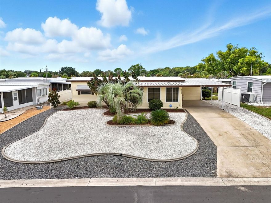 MOVE IN READY!!  Discover a vibrant 55+ waterfront community where you truly own your slice of paradise—no lot rent and low HOA fees! Located just minutes from shopping, dining, and entertainment, this friendly neighborhood sits between Lake Harris and Lake Eustis. A freshwater canal within the community provides direct access to the beautiful chain of lakes, perfect for endless days on the water. No need to worry about yardwork, the rock landscaping is low maintenance and allows you more time to play in the Florida sunshine. Enjoy the lake life lifestyle at its best. Bring your boat and a sense of adventure to embrace and connect with wonderful neighbors.
Want to feel safe for hurricane season?  This home comes with tie downs in place.  (Sidenote:  No damage to the home during Milton and Helene)
Home Warranty being offered !!