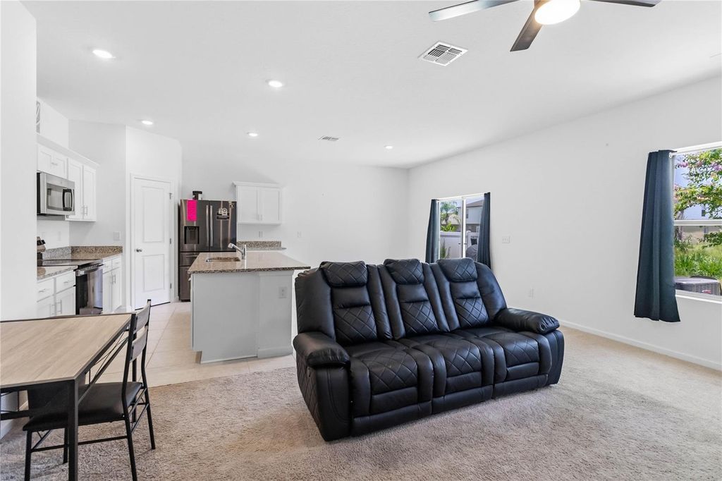 Photo of 1457 Dalkeith Cove, Sanford, FL 32771 (MLS # O6423854)