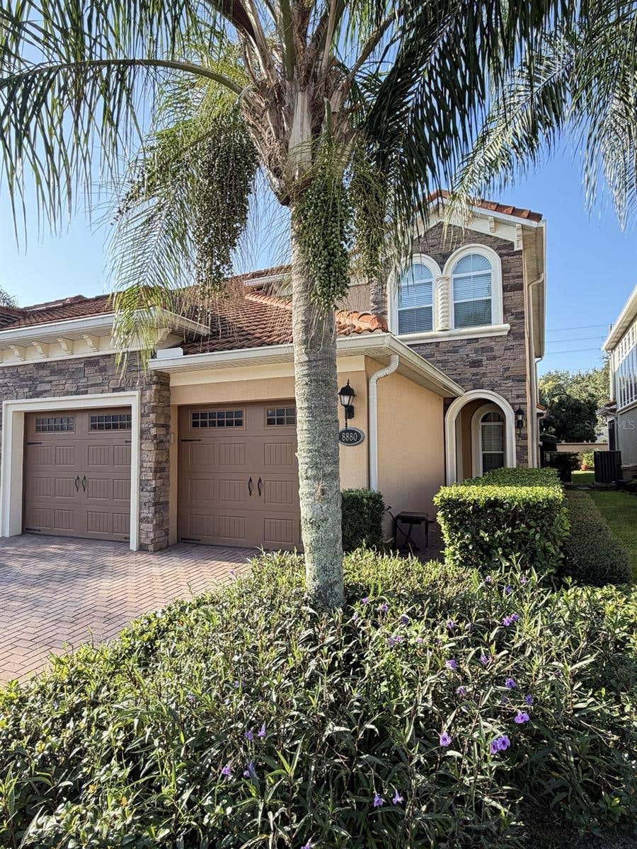 Photo of 8880 Della Scala Circle, Orlando, FL 32836 (MLS # O6435164)