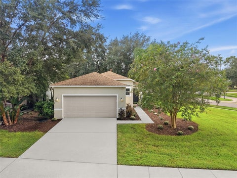 Photo of 2306 Spring Hollow Loop, Wesley Chapel, FL 33544 (MLS # TB8548337)