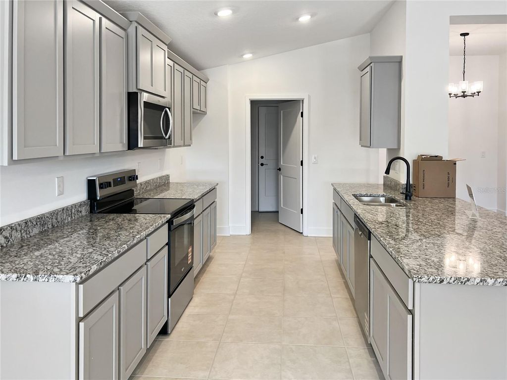 Photo of 258 Verny Grove Ln, Leesburg, FL 34748 (MLS # O6369552)