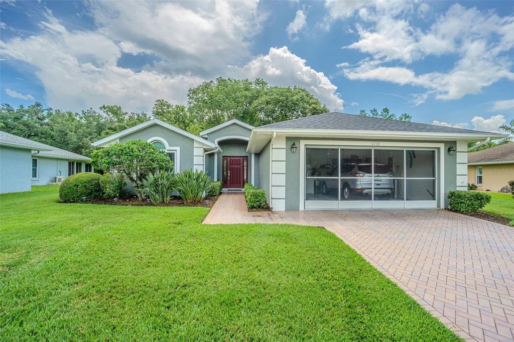 Photo of 10728 Moshie Lane, San Antonio, FL 33576 (MLS # TB8397274)