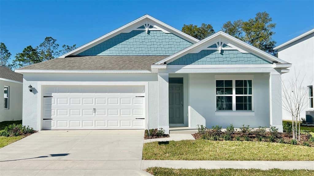 Photo of 968 Champion Ridge Drive, Daytona Beach, FL 32124 (MLS # O6433420)