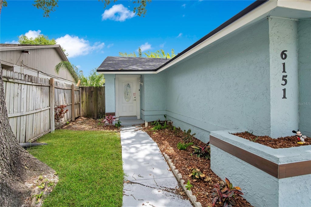 Photo of 6151 Sandcrest Circle, Orlando, FL 32819 (MLS # O6430614)