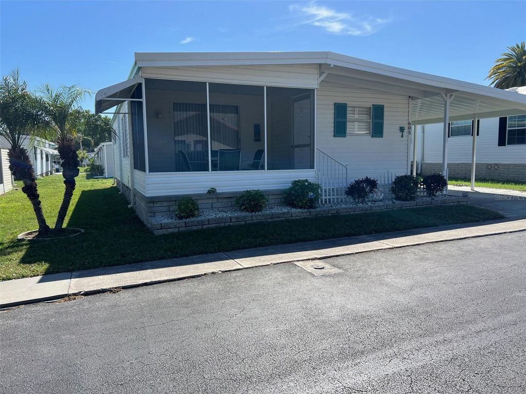 Photo of 605 Queen Palm Street, Largo, FL 33778 (MLS # TB8486797)