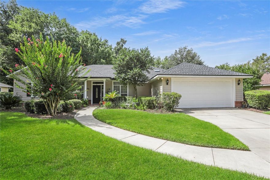 Discover this beautifully maintained 2005 custom-built residence, offering 2,381 sq. ft. of living space with 4 bedrooms and 3 bathrooms, perfectly situated on nearly a quarter-acre in the desirable White Oaks neighborhood of the peaceful Turkey Creek Golf Community. From the moment you arrive, you’ll be captivated by the home’s charming curb appeal, featuring lush, mature landscaping. Step inside and you’ll immediately appreciate the thoughtful design and meticulous planning that went into every detail—high ceilings, crown molding, elegant fixtures, and quality finishes throughout. The inviting entry opens to a spacious living area adorned with stunning pecan hardwood flooring, ideal for family gatherings and entertaining. The well-appointed kitchen boasts hardwood cabinetry, granite countertops, newer stainless steel appliances, and a breakfast bar overlooking the cozy family room with its welcoming fireplace—perfect for chilly evenings. A large pantry and a separate laundry room, complete with a new washer and dryer, add both convenience and function. Enjoy Florida living at its finest in the screened-in back lanai, which overlooks a beautifully landscaped, fenced yard backing up to green space. Expansive windows and skylights throughout the home flood the space with natural light, creating a bright, airy atmosphere. The primary suite is a true retreat, featuring a spacious layout, walk-in and linen closets, dual sinks with cultured marble countertops, a jetted tub, and a separate walk-in shower. Three additional bedrooms with carpet flooring offer comfortable accommodations for family or guests, while two guest bathrooms also feature cultured marble finishes. A versatile bonus room provides the perfect space for a home office, playroom, or flex space, and the large garage offers ample storage. White Oaks residents enjoy access to their own private pool, plus full use of Turkey Creek’s outstanding amenities—including an 18-hole golf course, pickleball and tennis courts, clubhouse, dog park, restaurant, community pool, and more. Conveniently located just 10 minutes from I-75, top-rated schools, shopping, restaurants, and medical facilities, this home also offers quick access to the world-renowned Santa Fe River and Florida’s famous freshwater springs. Don’t miss your opportunity to make this exceptional property your forever home—schedule your showing today!