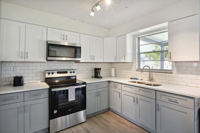 Photo of 813 W Magnolia Street, Kissimmee, FL 34741 (MLS # O6430474)