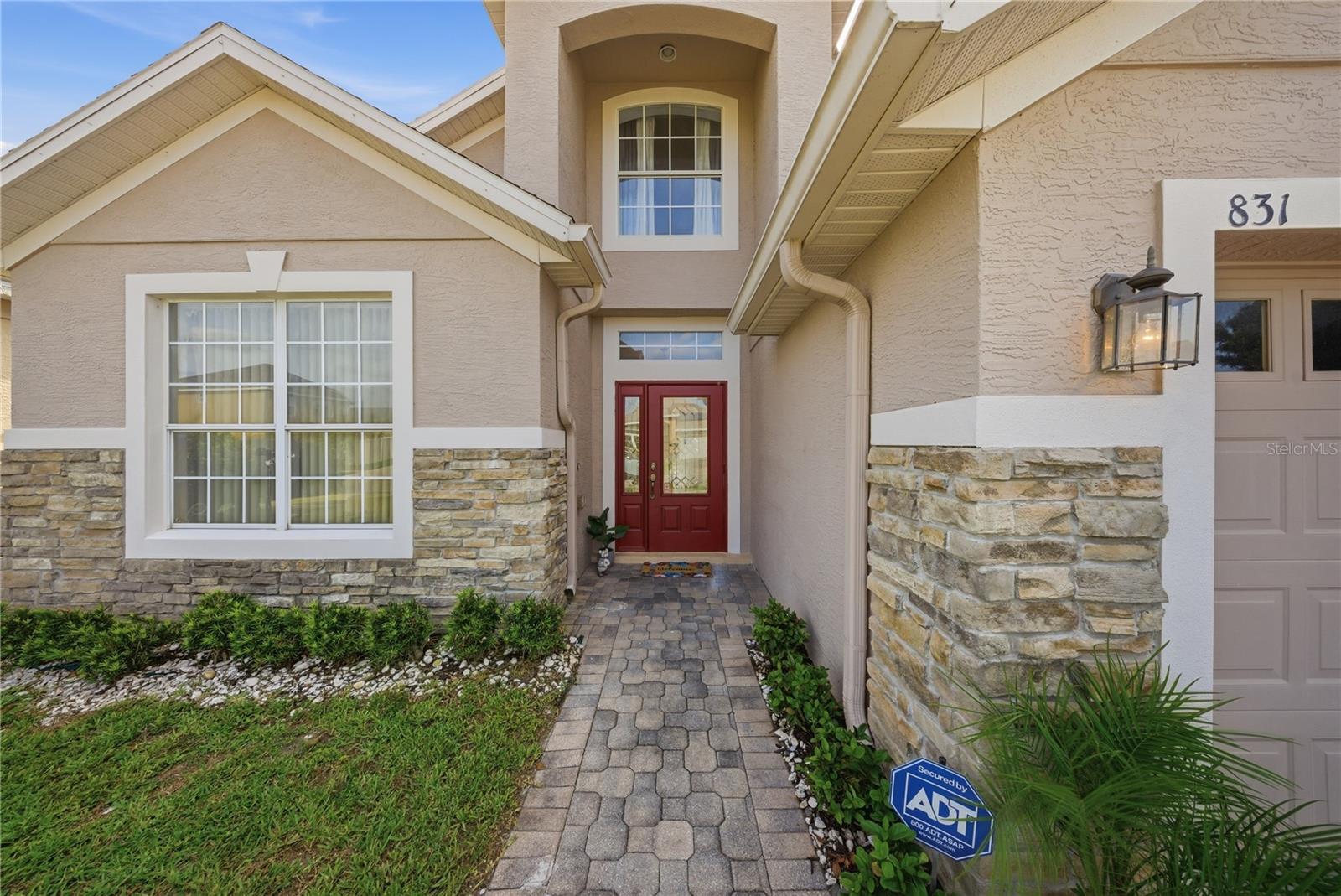 831 WHISPERING CYPRESS LANE