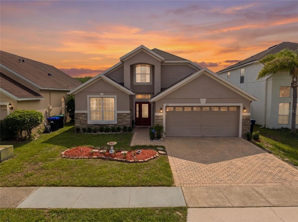 Photo of 831 Whispering Cypress Lane, Orlando, FL 32824 (MLS # O6414195)