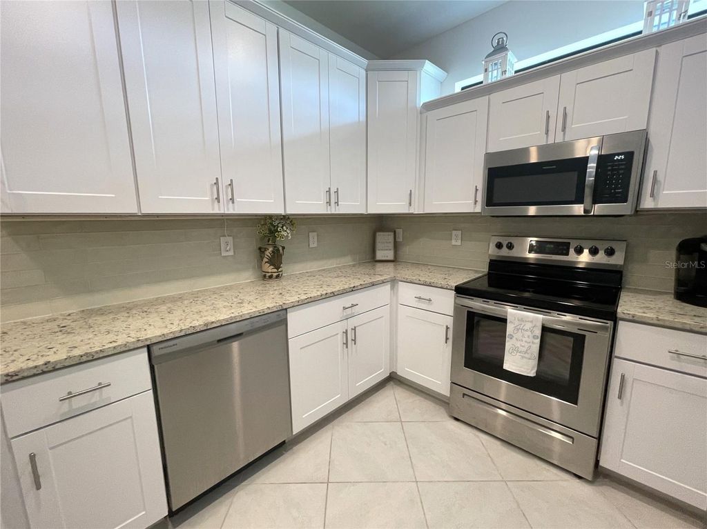 Photo of 1912 Saddlewood Circle, Port Charlotte, FL 33953 (MLS # C7512005)